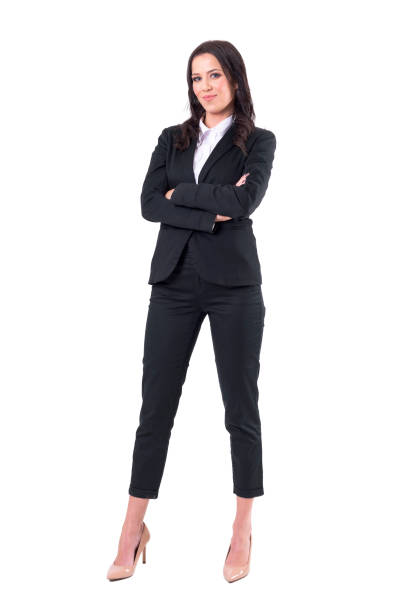 Confident successful independent strong business woman with crossed arms in elegant suit stock photo