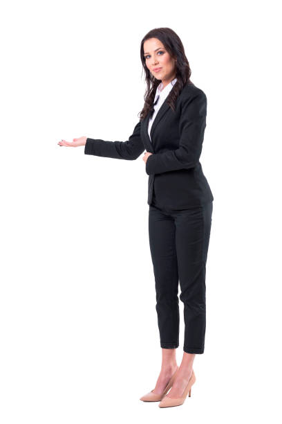 istock Beautiful confident friendly business woman with inviting gesture looking at camera 1133578231