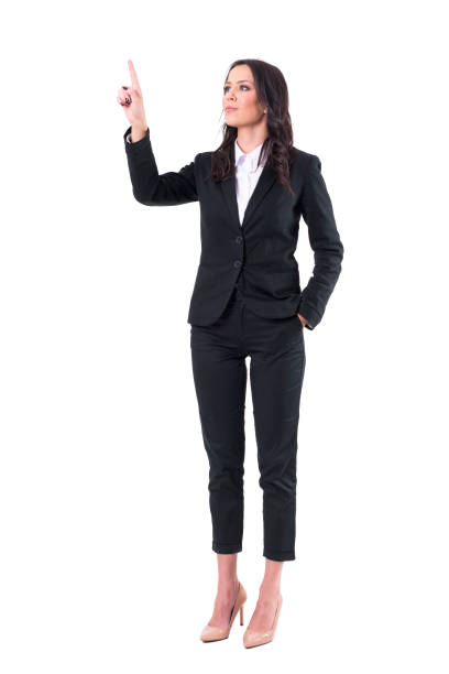 istock Confident elegant business woman pointing finger touching virtual reality push button screen 1133578428