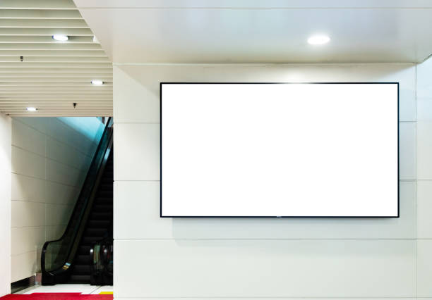 empty billboard with escalator in subway station - afixar cartaz imagens e fotografias de stock