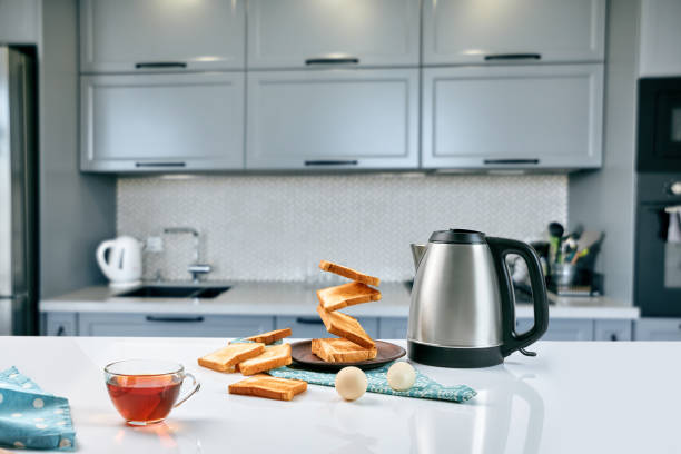 istock Fresh delicious breakfast with crispy toasts and cup coffee or tea on grey background. 1133581679