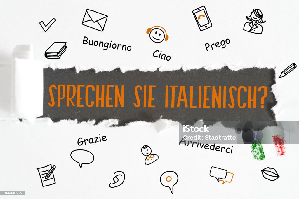 A piece of paper and question Speak Italian A sheet of paper and question Speak Italian Alphabet Stock Photo