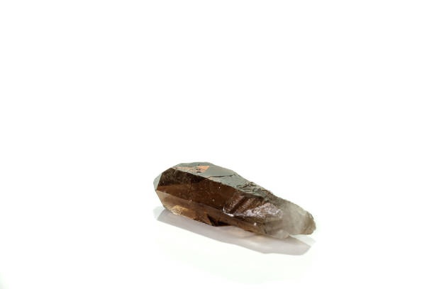 istock Macro mineral stone smoky quartz, rauchtopaz on a white background 1133582589