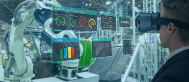 iot industry 4.0 concept,industrial engineer(blurred) using smart glasses with augmented mixed with virtual reality technology to monitoring machine in real time.Smart factory use Automation robot arm iot industria 4,0 concepto, ingeniero industrial (borroso) utilizando gafas inteligentes con aumentado mezclado con tecnología de realidad virtual para monitorear la máquina en tiempo real. brazo robot de automatización de uso de fábrica inteligente