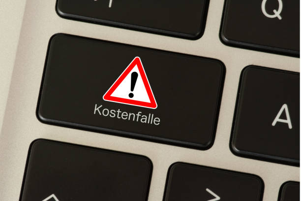 istock A computer and a button warning of a cost trap 1133585053
