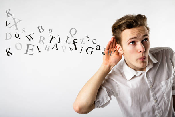 istock Curious young man in white is eager to know all the gossip. Curious man and letters. Information concept. 1133586203