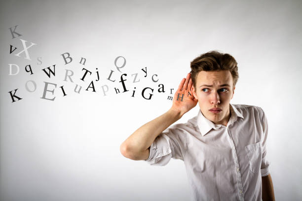 istock Curious young man in white is eager to know all the gossip. Curious man and letters. Information concept. 1133586257