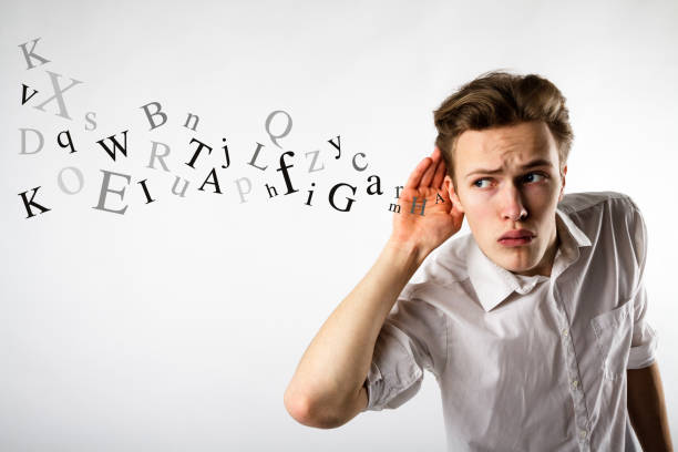 istock Curious young man in white is eager to know all the gossip. Curious man and letters. Information concept. 1133586263