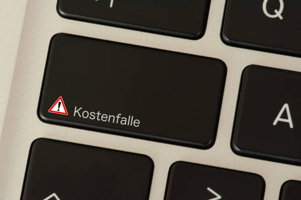 istock A computer and a button warning of a cost trap 1133586491