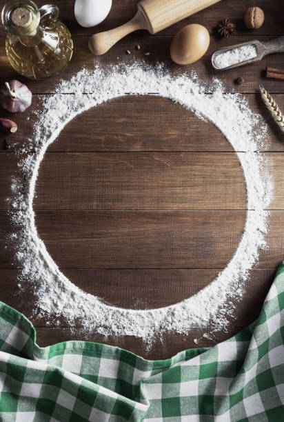 istock wheat flour and bakery ingredients on wooden table 1133587195