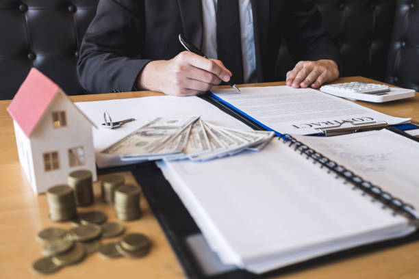 istock Client signing agreement contract real estate with approved application form, buying or concerning mortgage loan offer for and house insurance 1133587369