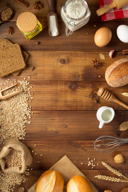 istock wheat grains and bakery ingredients on wooden background 1133589839