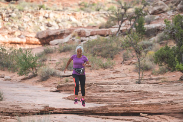 istock Senior woman going for a trail run in the desert 1133590517