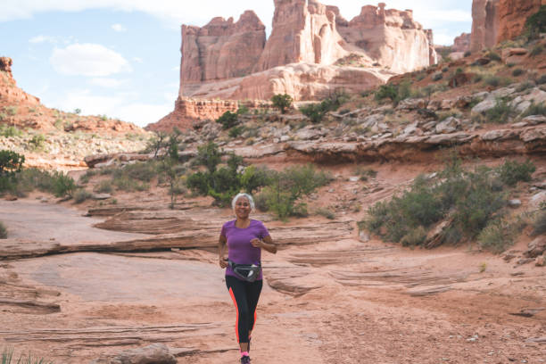 istock Senior woman going for a trail run in the desert 1133590527