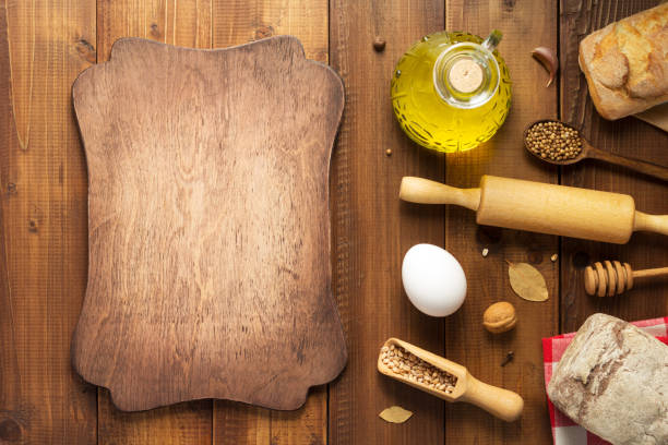 istock bread and bakery ingredients on wooden table background 1133591695