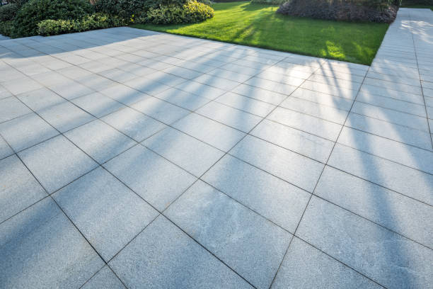 istock Green lawn and marble tiles 1133593998