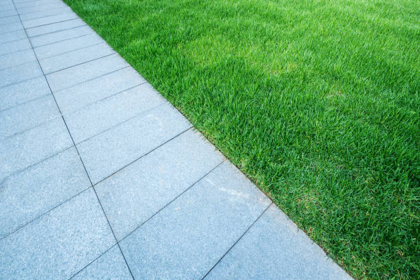 istock Green lawn and marble tiles 1133594449