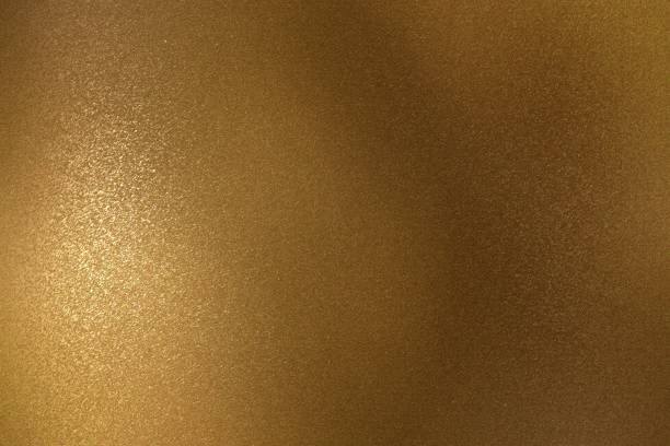 istock Shiny rough bronze metal wall, abstract texture background 1133595756