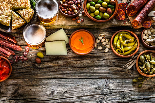 istock Tapas and beer: typical spanish food shot from above making a frame 1133595886