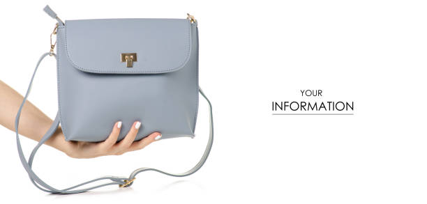 istock Female blue gray leather bag in hand pattern 1133597186
