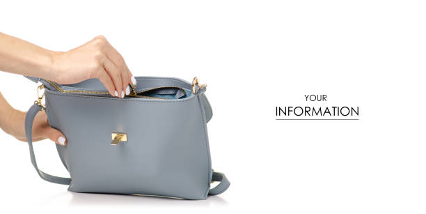 istock Female blue gray leather bag in hand pattern 1133597187