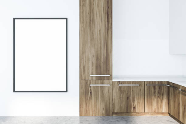 istock White and wooden kitchen with poster 1133597354