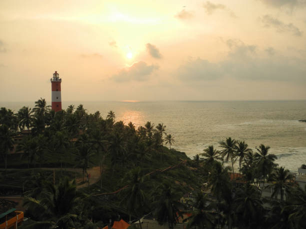 istock Sea, palm trees and lighthouse, Kerala, Trivandrum, Kovalam 1133597736