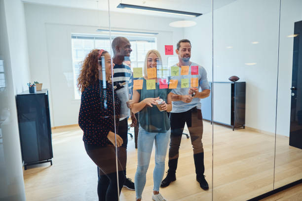 istock Designers smiling during an office brainstorming session 1133598844