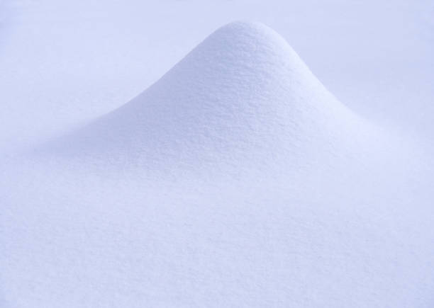 istock Snowdrift and snow texture on a bright sunny day 1133604760