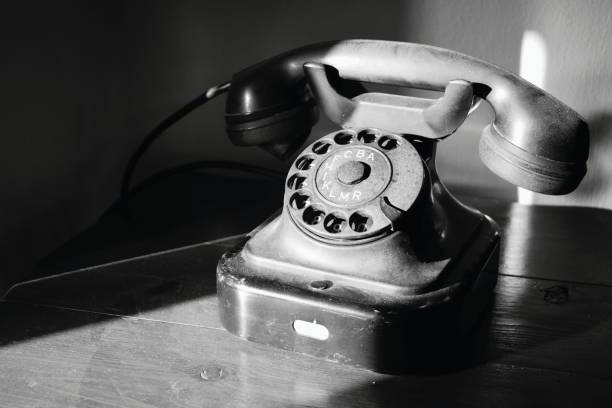 istock Abandoned nostalgic old style dial telephone in black and white 1133605401