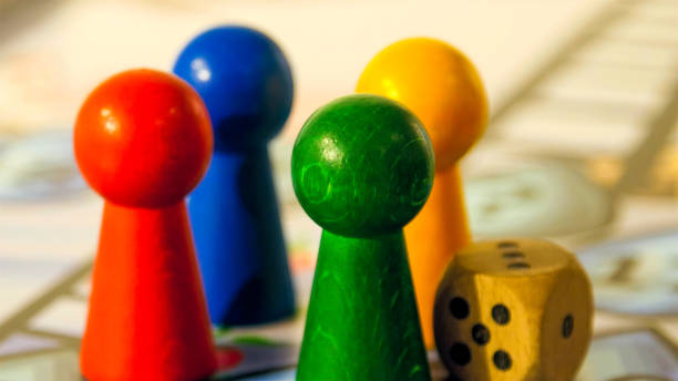 istock Four clorful pins used in a board games 1133607147