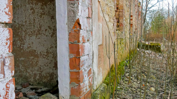 istock Red bricks as a wall of the ruined house 1133608645