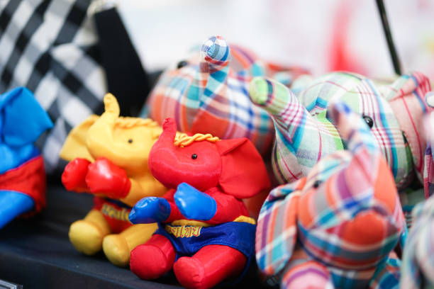 Elephant doll. Common souvenir from Thailand elephant plush doll wearing boxer pants. Thai text translates as Thai boxing.