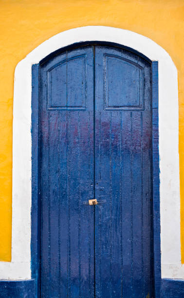 Colorful rustic door facade Colorful rustic door facade blue front door stock pictures, royalty-free photos & images