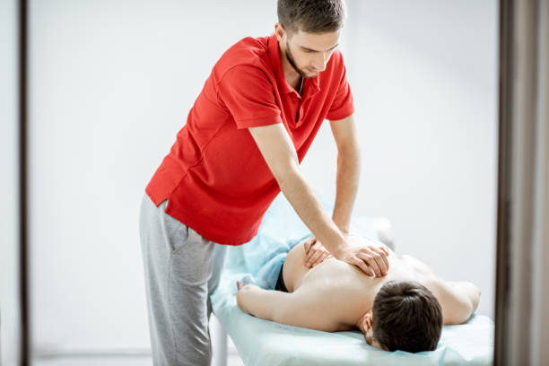 istock Therapist doing male massage 1133615405