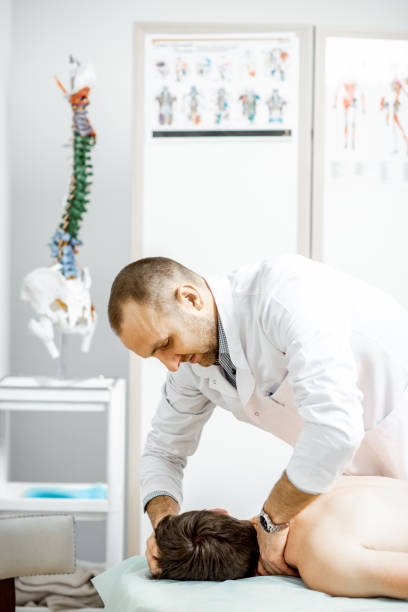 istock Physiotherapist doing manual treatment 1133615486