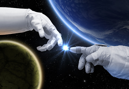 Hand of astronaut and robot near star. Concept Encounters. Contact with other civilizations. Elements of this image furnished by NASA.