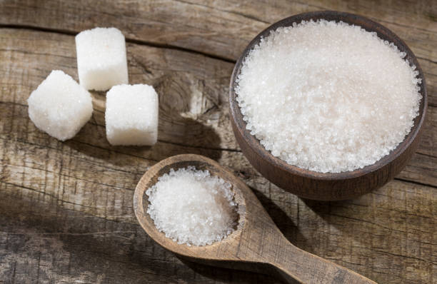 istock Refined white sugar powder and cubes 1133618898