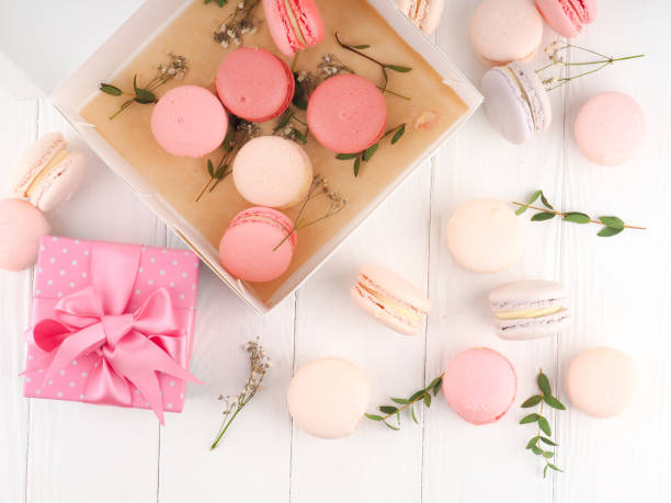 istock Colorful French or Italian macarons stack on white wood table with copy space for background. Dessert for served with afternoon tea or coffee break. 1133618913