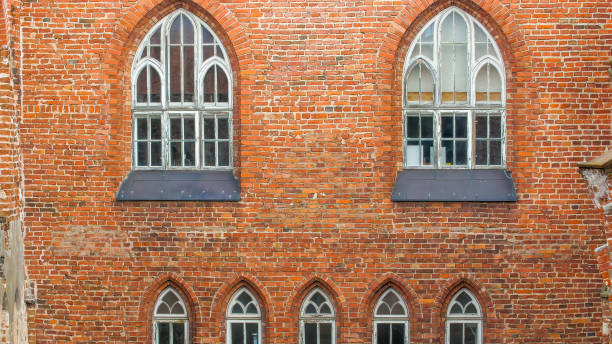 istock The red bricked wall old building 1133618972