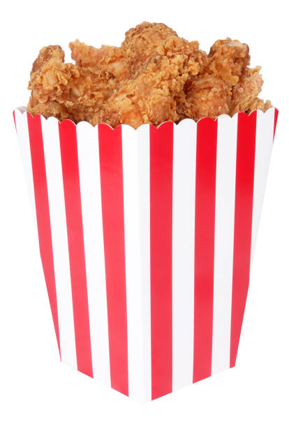 istock Fried chicken nuggets in red white striped box 1133620002