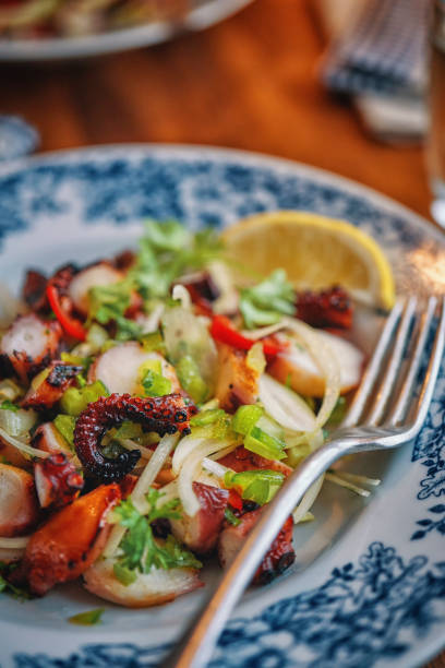 Octopus Ceviche with Fish, Onion, Chili Pepper and Lemon