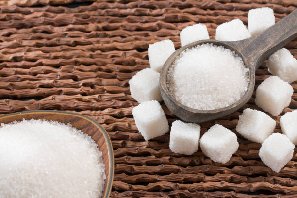 istock Refined white sugar powder and cubes 1133623801