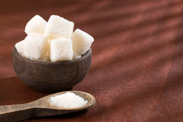 istock Refined white sugar powder and cubes 1133626322