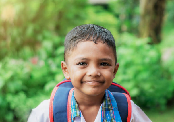istock Child happy go to school on blurred bokeh 1133629360