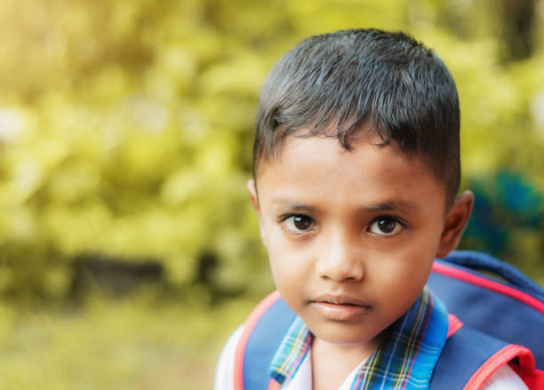 istock Child go to school on blurred bokeh nature 1133629372