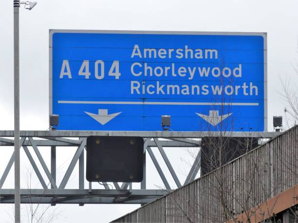 M25 Motorway exit sign at Junction 18 for Amersham, Chorleywood and Rickmansworth This photo was taken in Chorleywood, Hertfordshire, England, UK amersham stock pictures, royalty-free photos & images