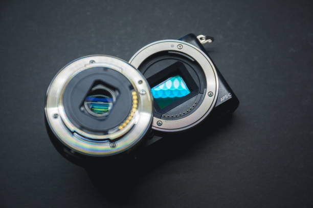 istock Close-up of mirrorless digital APS-C camera with deattached lens. 1133632997