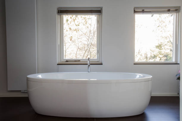 istock White freestanding bathtub in designed modern bathroom 1133633290