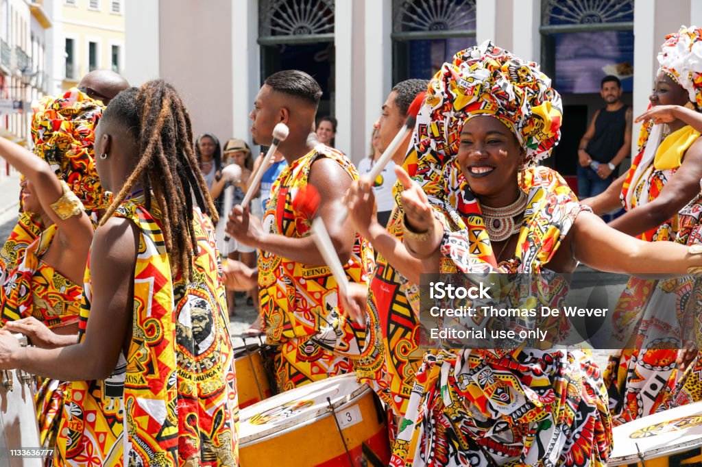 Dancer's small parade with traditional costumes celebrating with revelers the Carniva Dancer's small parade with traditional costumes celebrating with revelers the Carnival on the streets. Salvadore, Bahia, Brazil, 02/11/2019 Carnival - Celebration Event Stock Photo